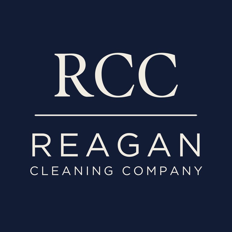 RCC Reagan Cleaning Company logo with white text on dark blue background
